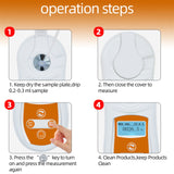 The digital brix refractometer being used to test the sugar content of a freshly cut orange.