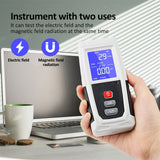 The EMF meter held near a laptop, demonstrating its use for testing common household appliances.