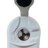 A person using the digital salinity meter to test a water sample in a petri dish.