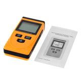 The complete GM3120 EMF Detector package including the meter, the retail box, and the English user manual.