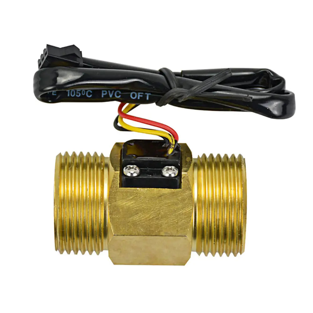 Close-up of the water flow sensor component, showing the inlet and outlet ports.