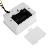 Rear view of the digital flow meter showing the battery compartment for 3x AA batteries.