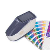 Side profile of the YS3010 Spectrophotometer, highlighting its ergonomic handheld design.