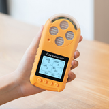 BX400 portable 4 gas monitor held in one hand