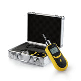 Yellow pump gas detector beside an open aluminum carrying case with another instrument visible