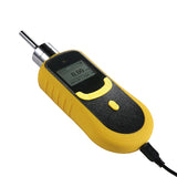 Angled yellow and black pump gas detector with straight metal inlet and charging cable